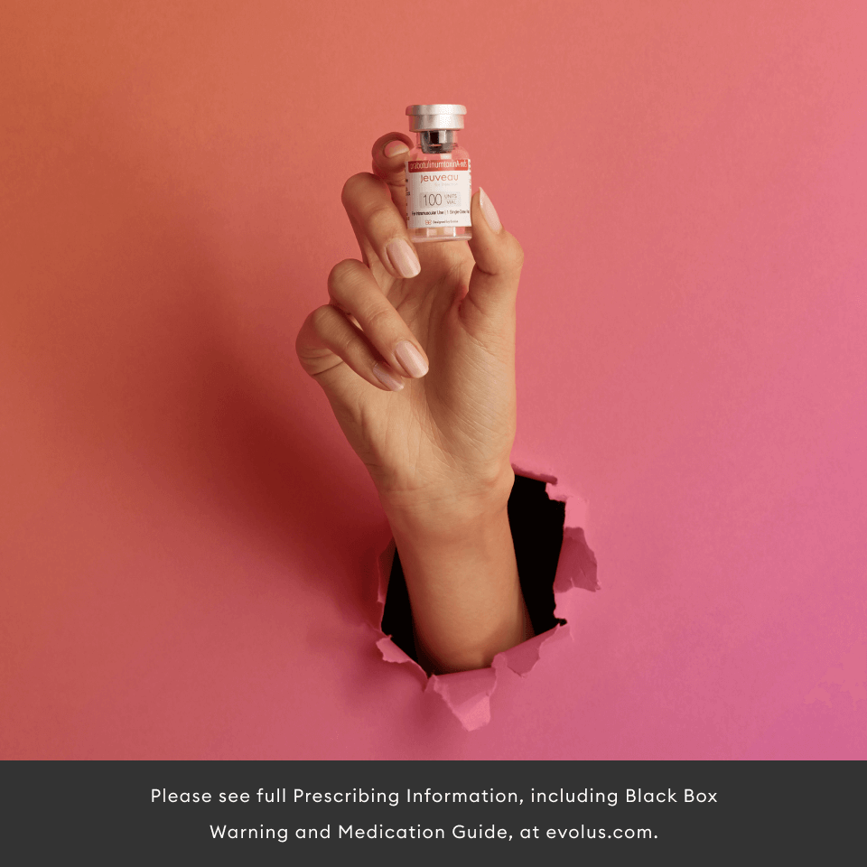 Woman holding neurotoxin bottle 