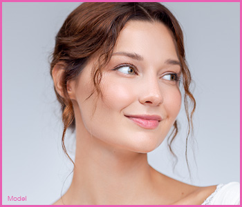 Young woman with high cheek bones smiling